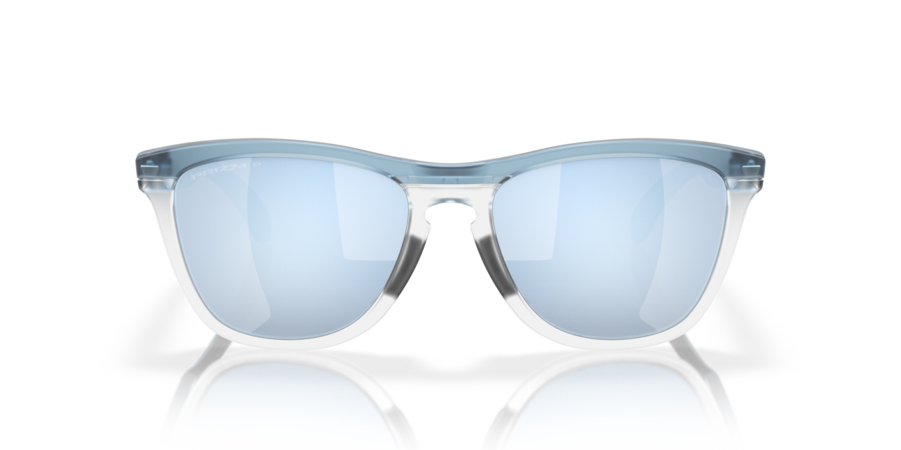 Oakley FROGSKINS RANGE mit Rahmen Trans Stonewash/Clear und mit Dias Prizm Deep Water Polarized 55