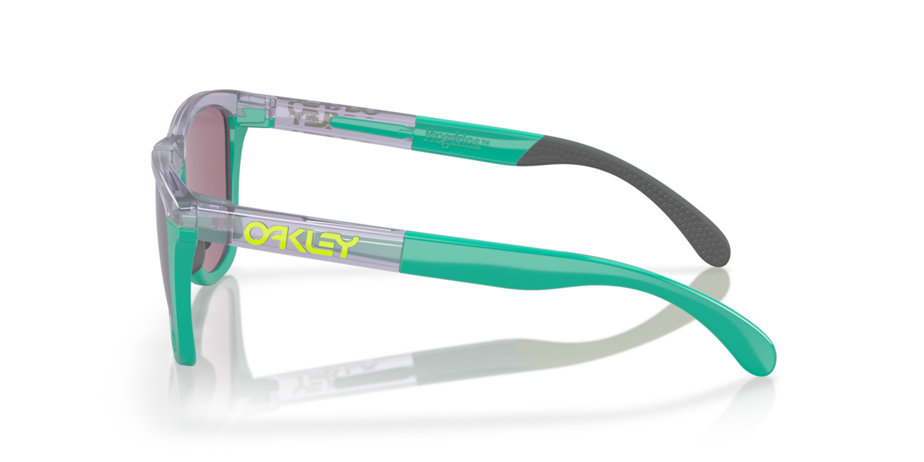 Oakley FROGSKINS RANGE Sonnenbrille mit Rahmen Trans Lilac/Celeste und mit Dias Prizm Jade 55