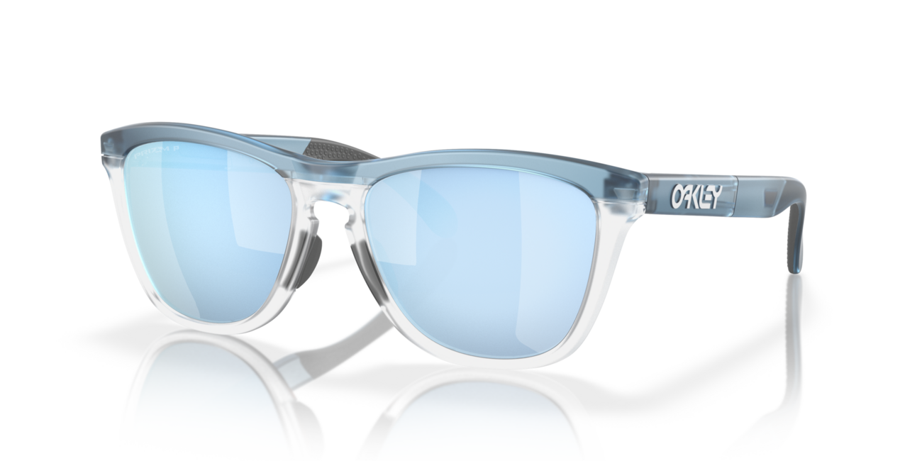 Oakley FROGSKINS RANGE mit Rahmen Trans Stonewash/Clear und mit Dias Prizm Deep Water Polarized 55